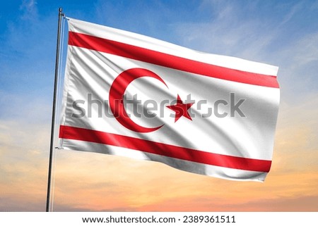Flag of Northern Cyprus waving flag on sunset view
