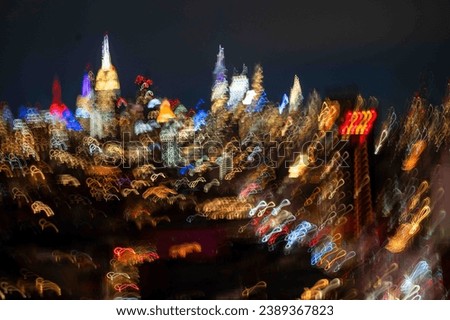 Excellent abstract high energy icm motion blur background dark night image of New York City skyline bright colorful lights. No people, with copy space