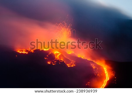 Explosion during the eruption of Mount Etna Royalty-Free Stock Photo #238936939