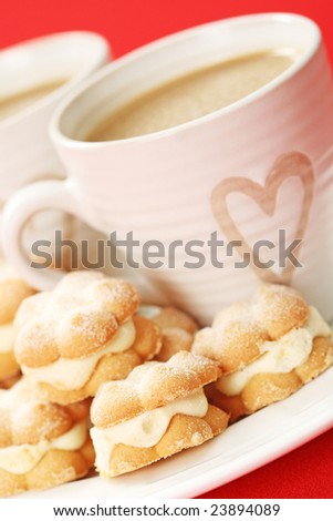 two cups of coffee and delicious cookies