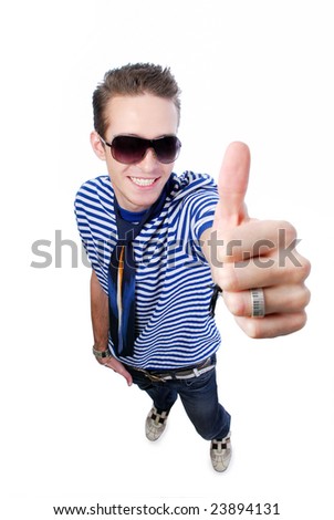 Modern young guy showing thumbs-up sign - high angle view
