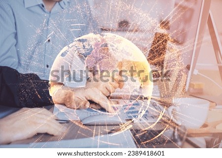 Social network theme hologram with businessman working on computer on background. Multi exposure.