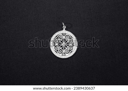 Hmong silver jewelry on black background