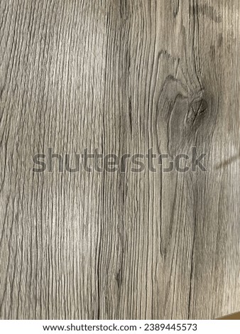 Wood texture background. Top view of vintage wooden table with cracks. Light brown surface of old knotted wood with natural color.