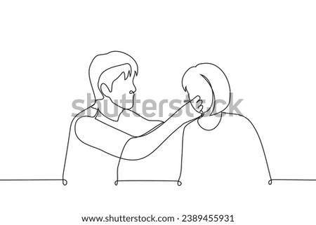 man spoon feeding an adult woman - one line art vector. concept care, social worker, caring for a disabled person, treat, give a try