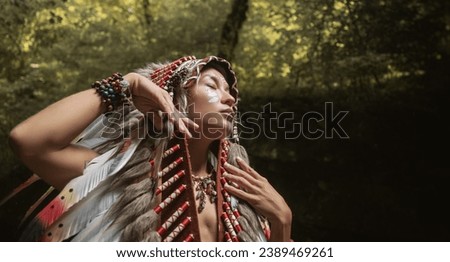 portrait of a young girl in Native American Headdresses against the background of nature