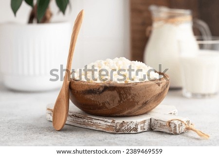Natural cottage cheese. Natural dairy products. Royalty-Free Stock Photo #2389469559