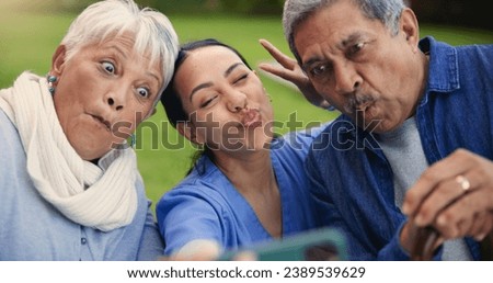 Selfie, peace sign or funny face with a nurse and old couple outdoor in an assisted living garden together. Comedy, support or wellness with a senior man, woman and young caregiver in the backyard