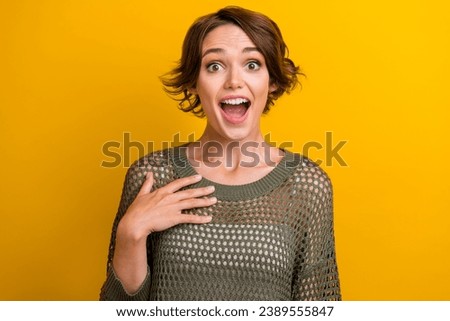 Photo of cheerful funky girl dressed trendy clothes rejoice unexpected unbelievable news isolated on yellow color background Royalty-Free Stock Photo #2389555847