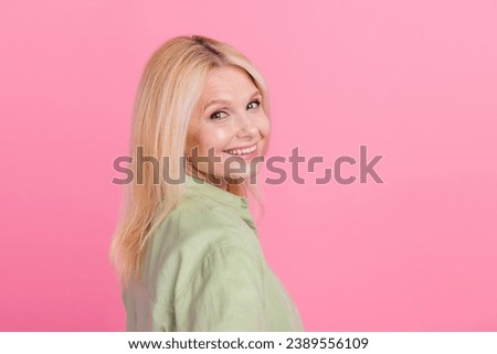 Portrait of positive pensioner lady wear stylish clothes beaming smile good mood empty space isolated on pink color background