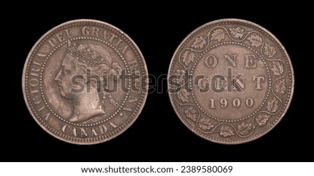 Large Canada cent isolated on black with Queen Victoria on front and date of 1900, maple leaf wreath, and die crack (left side) on reverse. H mint mark denoting The Mint Birmingham, Ltd. VF condition. Royalty-Free Stock Photo #2389580069