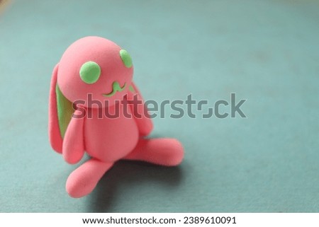 plasticine figurine pink rabbit close-up
