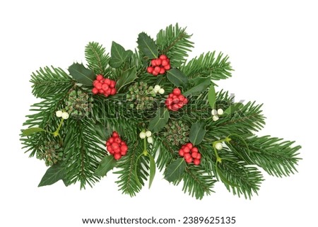 Christmas winter greenery floral decoration with holly berries, spruce fir, mistletoe, ivy, on white background, Festive green greeting card design for New Year, Yule, Noel.
