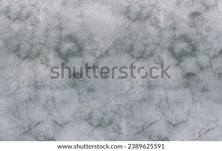 Texture of a gray wall. Old wall with cracked texture. Cracked cement wall background. Textured and cracked wall. Textured old wal l background