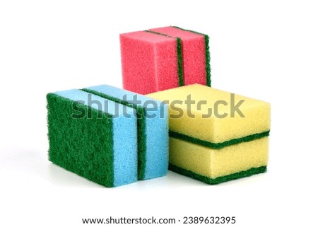 Sponge for washing dishes, isolated on white background. High resolution image