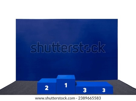 Blue podium for sports awards isolated on white background. Sport winner award stand. Achievement and competition concept. Prize numbers. Free space for text Royalty-Free Stock Photo #2389665583