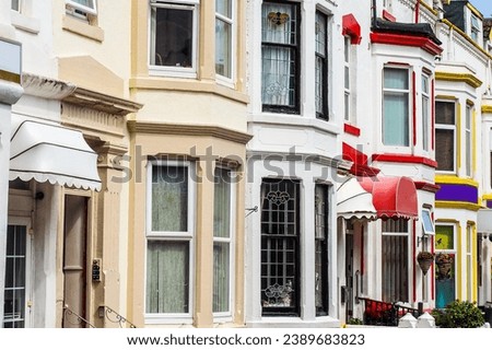 Victorian houses stock photos. vibrant colors, and timeless design of these iconic homes. 