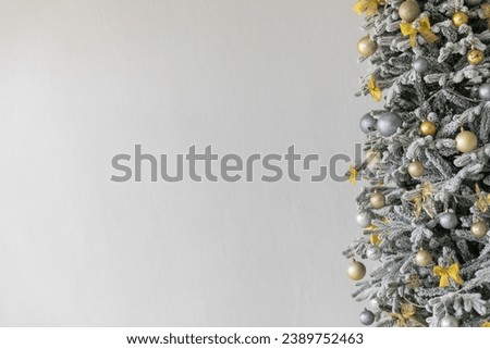 White christmas tree with gifts and toys as background