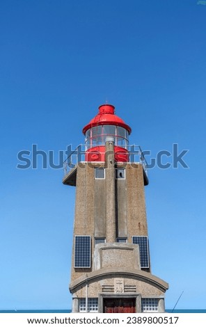Lighthouse  of the harbor in Fecamp, Normandy, France.