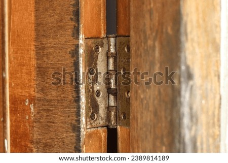 door hinges. the old door hinges are starting to rust