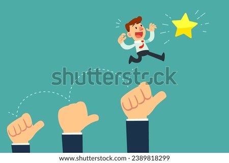 Businessman jump on rising thumb up hands to reach golden star. Review and compliment business concept. Royalty-Free Stock Photo #2389818299