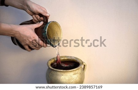 Retro holy Jew girl pray bible lord god story bless tasty eastern Israel Galilee juice clay vase bowl bottle text space. Rustic rural east male human guy master work alcohol cup pot food dinner symbol Royalty-Free Stock Photo #2389857169
