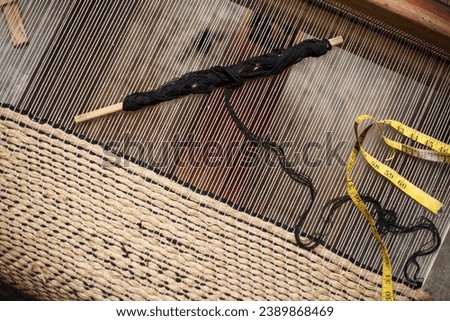 Rug weaving loom abstract photograph, Rangpur, Bangladesh.