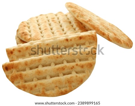 Greek pita bread or flatbread closeup and isolated Royalty-Free Stock Photo #2389899165
