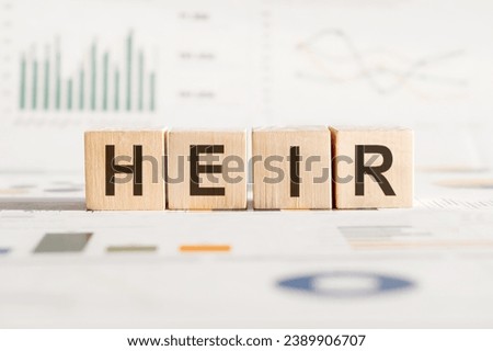 Heir symbol on wooden cubes. Business and Heir concept. Copy space