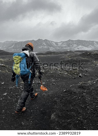 Guided expedition to an ice cave in Iceland Royalty-Free Stock Photo #2389932819