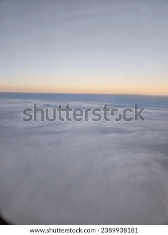 Magnificent sky and cloud picture taken from inside the plane
