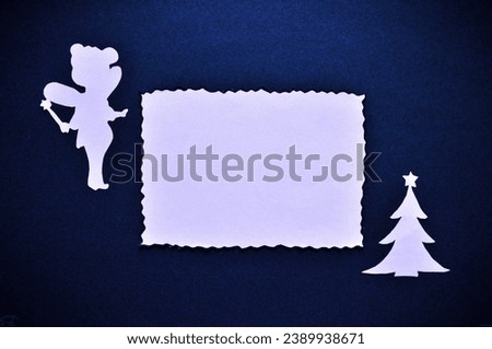empty white christmas card on blue background 