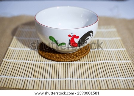 bowl depicting a rooster, a popular Indonesian bowl for noodle and meatball sellers