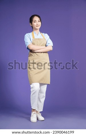 Image of young Asian woman on background Royalty-Free Stock Photo #2390046199