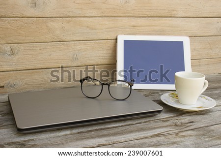 Still Life with business equipment on wood