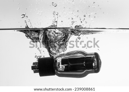 Black and white picture of a radio tube electronic valve that fall in water