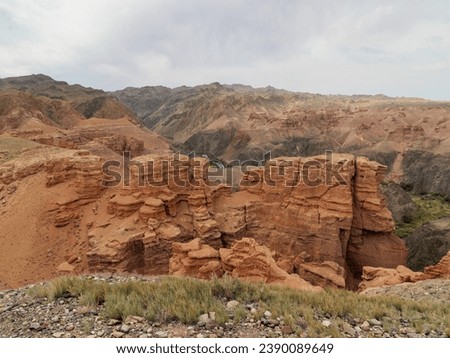 Charyn Canyon National Park. The road along the bottom of the Valley of Castles. Red rock formations formed as a result of erosion over millions of years. A small replica of the US Grand Canyon.