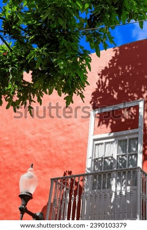 Las Palmas de Gran Canaria, Canary Islands, Spain - november 08 2022: Old red building in La Vegueta, a colorful neighbourhood in Las Palmas de Gran Canaria Royalty-Free Stock Photo #2390103379