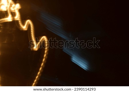 Abstract lights in night. Long exposure photography. Background texture.