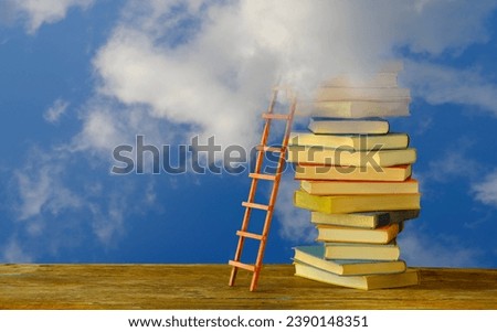The dream of proper Education,books, ladder of success leading to a cloudy sky. Learning,knowledge,humanism. personal development. Free copy space