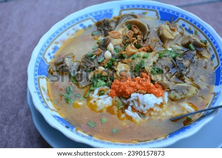 traditional Indonesian food known as soto campur. Soto is a typical Indonesian soup dish made from meat and vegetable stock. Soto is also known by local names such as sroto, sauto, tauto, or coto.