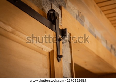 Ceiling mount sliding barn door hardware roller kit Royalty-Free Stock Photo #2390162685