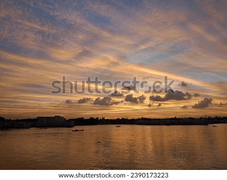 Beautiful sunny sunset lake picture