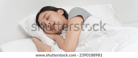 Wellness lifestyles concept, Young women sleep well on the bed with good condition and clean bedchamber Royalty-Free Stock Photo #2390188981