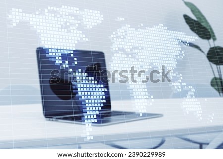Close up of laptop at light workplace with glowing digital pixel squares map of the world with spotlights on blurry background. Global business concept. Double exposure