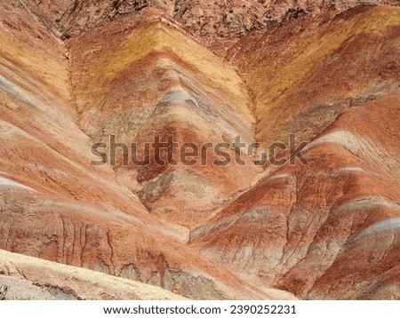 Yellow and red strata in sedimentary rock - geology - the rainbow mountains in china - zhangye danxia landform