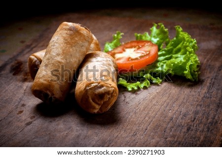 Picture of spring rolls filled with vegetables, typical Indonesian snack menu, taking pictures with decoration and artistic value, food photography