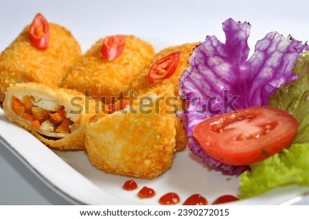 Images of Risoles filled with vegetables, typical Indonesian snack menu, taking pictures with decoration and artistic value, food photography
