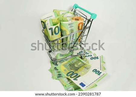 euro money in a shopping cart