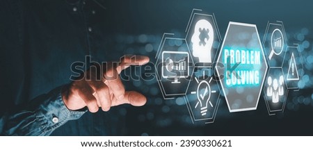Problem solving concept, Person hand touching problem solving icon on virtual screen. Royalty-Free Stock Photo #2390330621